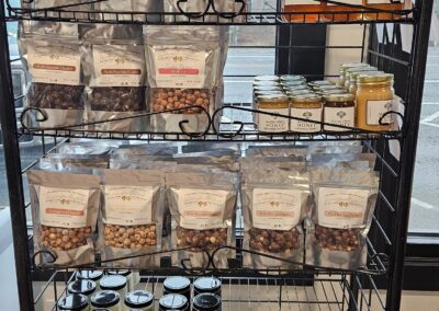 Photo of selection of snacks and local honey rack at Fall City Meats and Seafood